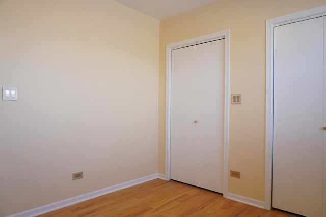 2665 W Warren Blvd Unit 3, Chicago, IL 60612 - unfurnished bedroom featuring light wood-style flooring and baseboards