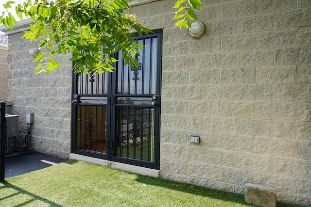 2665 W Warren Blvd Unit 3, Chicago, IL 60612 - view of exterior entry with concrete block siding