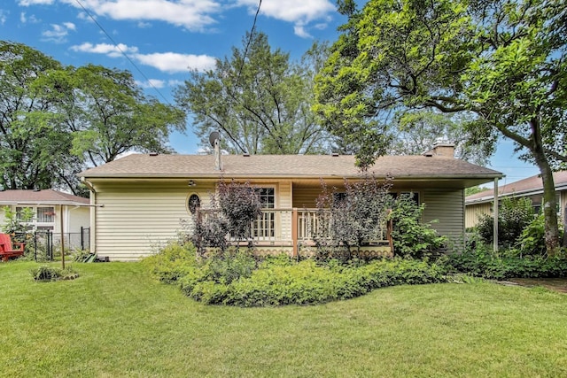 859 S Mount Prospect Rd, Des Plaines, IL 60016 - rear view of property featuring a chimney