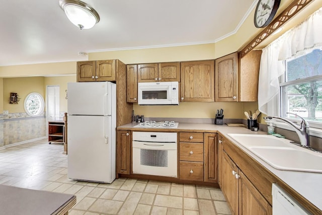 859 S Mount Prospect Rd, Des Plaines, IL 60016 - kitchen featuring white appliances, brown cabinetry, light countertops, and ornamental molding