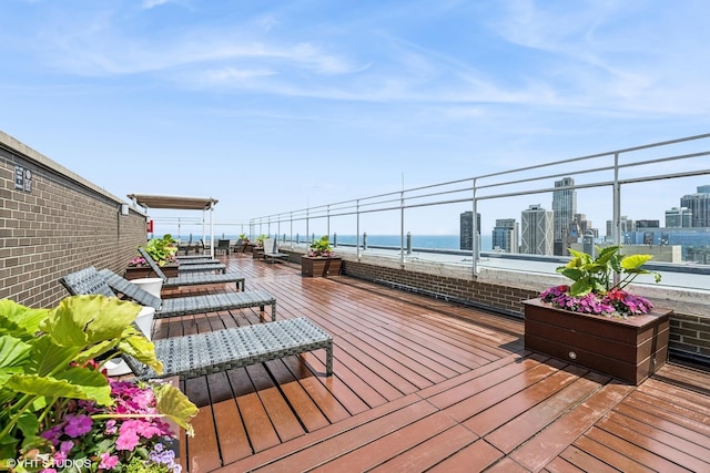 260 E Chestnut St Unit 1210, Chicago, IL 60611 - wooden deck with a water view and a view of city