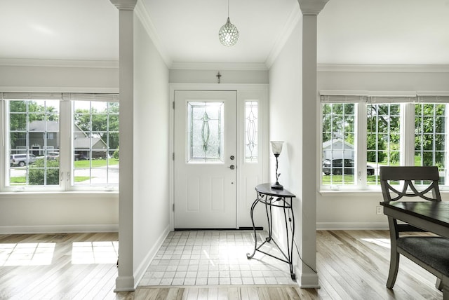 2004 Pine Dr, Mchenry, IL 60051 - entrance foyer with plenty of natural light, light wood-type flooring, and crown molding