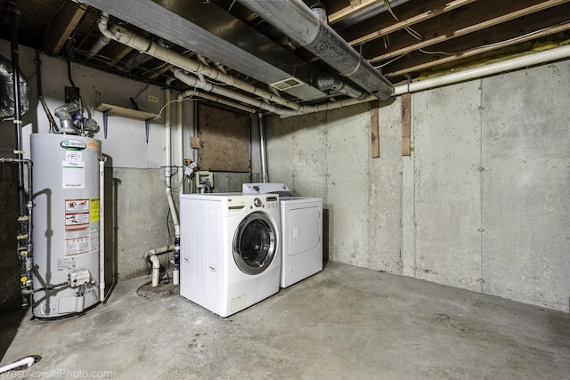 2004 Pine Dr, Mchenry, IL 60051 - unfinished below grade area with washer and dryer, gas water heater, and drainage system