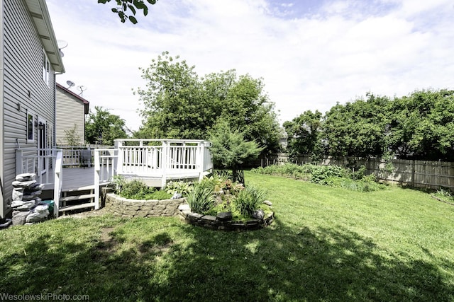 2004 Pine Dr, Mchenry, IL 60051 - fenced yard with a deck