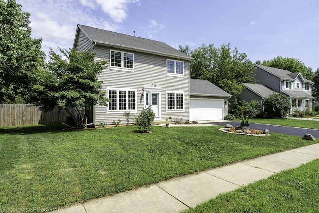 2004 Pine Dr, Mchenry, IL 60051 - colonial-style house featuring driveway, an attached garage, and a shingled roof