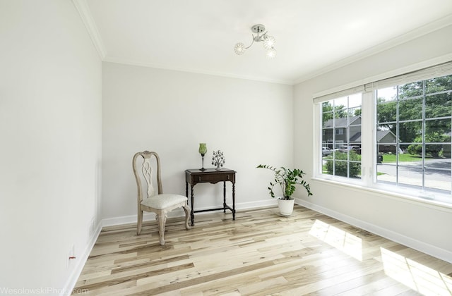 2004 Pine Dr, Mchenry, IL 60051 - living area with light wood-style flooring, crown molding, and a chandelier