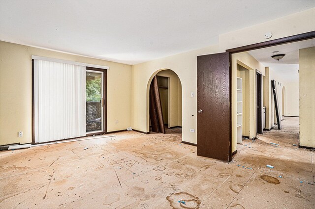 3038 225th St, Sauk Village, IL 60411 - spare room featuring arched walkways
