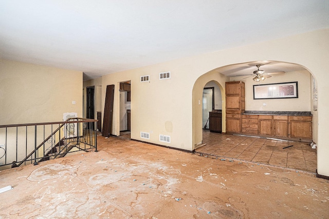 3038 225th St, Sauk Village, IL 60411 - empty room featuring arched walkways and ceiling fan