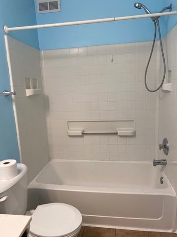 59 S Treehouse Ln S Unit 59, Round Lake, IL 60073 - bathroom featuring shower / washtub combination, vanity, and tile patterned floors