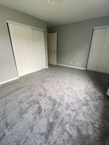 59 S Treehouse Ln S Unit 59, Round Lake, IL 60073 - unfurnished bedroom featuring carpet and ceiling fan