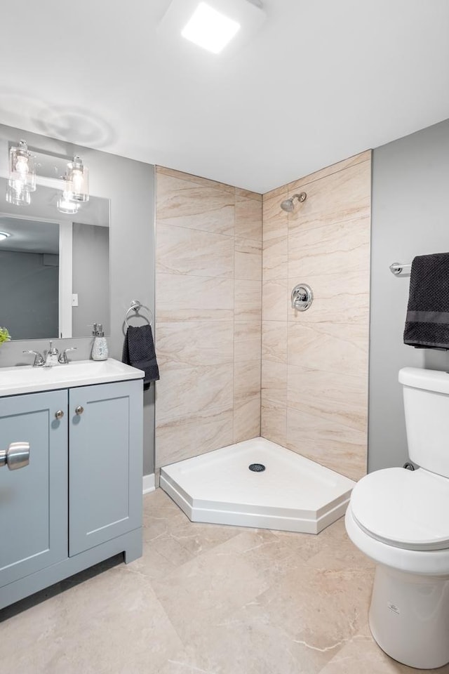 526 S Calumet Ave, Aurora, IL 60506 - bathroom with vanity, a tile shower, and marble look tile flooring