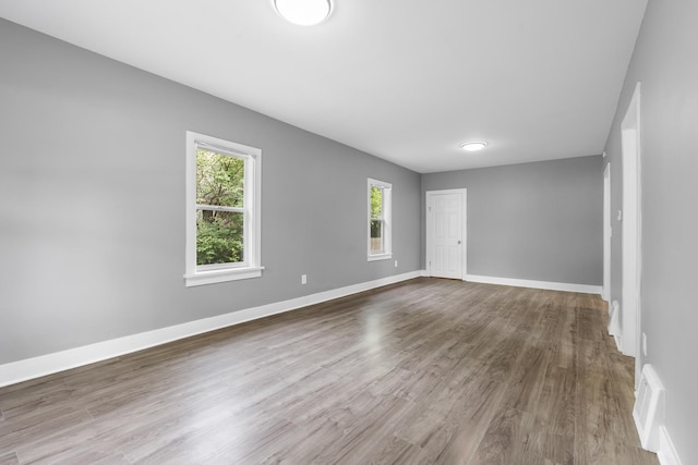 526 S Calumet Ave, Aurora, IL 60506 - empty room featuring wood finished floors and baseboards