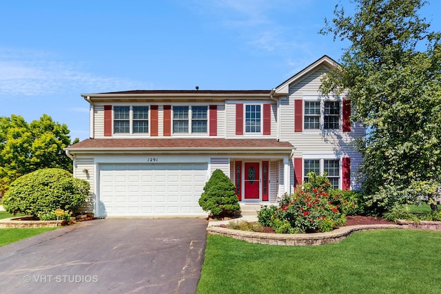1291 White Chapel Ln, Algonquin, IL 60102 - traditional home with driveway, an attached garage, and a front lawn