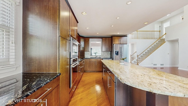 1291 White Chapel Ln, Algonquin, IL 60102 - kitchen with light wood-style floors, a center island, stainless steel appliances, decorative backsplash, and recessed lighting