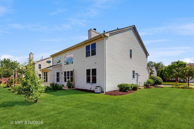 1291 White Chapel Ln, Algonquin, IL 60102 - rear view of property with a yard and a chimney
