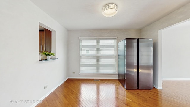 1291 White Chapel Ln, Algonquin, IL 60102 - spare room with hardwood / wood-style flooring and baseboards