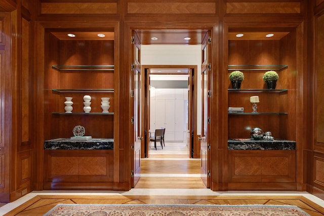 189 E Lake Shore Dr Unit Ph18, Chicago, IL 60611 - detailed view of built in shelves, wood finished floors, and wood walls