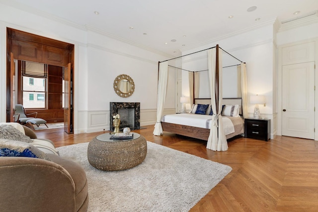 189 E Lake Shore Dr Unit Ph18, Chicago, IL 60611 - bedroom featuring crown molding, a fireplace, and wainscoting