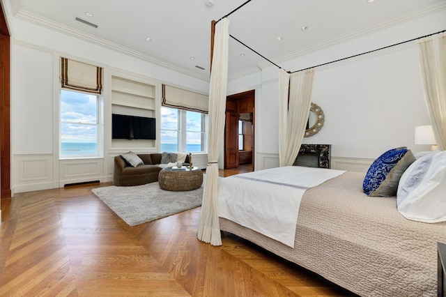 189 E Lake Shore Dr Unit Ph18, Chicago, IL 60611 - bedroom with crown molding, a decorative wall, and a wainscoted wall