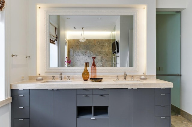 189 E Lake Shore Dr Unit Ph18, Chicago, IL 60611 - bathroom featuring double vanity and a tile shower