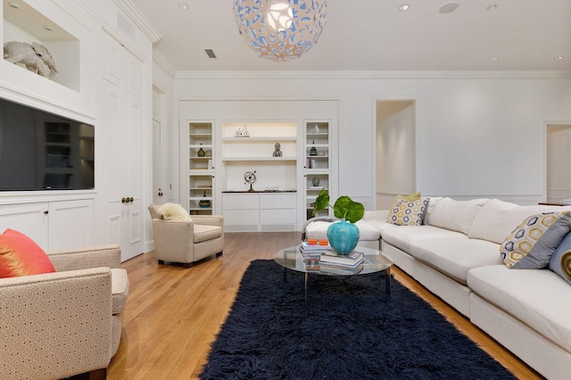 189 E Lake Shore Dr Unit Ph18, Chicago, IL 60611 - living room with light wood-style floors, crown molding, built in shelves, and a chandelier