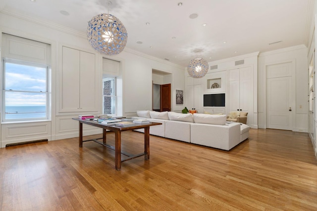 189 E Lake Shore Dr Unit Ph18, Chicago, IL 60611 - living room with a chandelier, light wood finished floors, and ornamental molding
