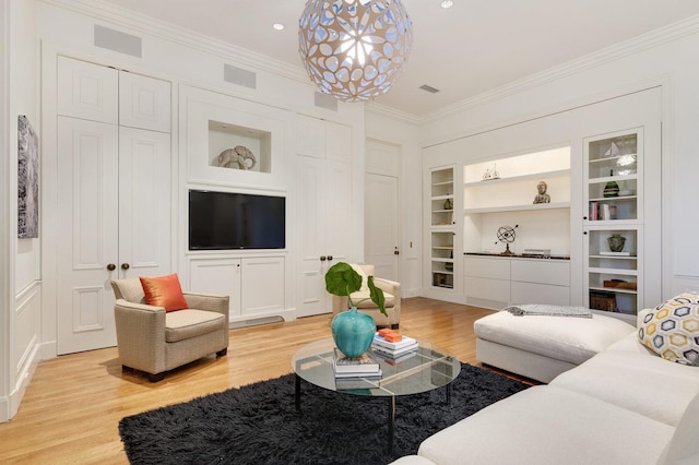 189 E Lake Shore Dr Unit Ph18, Chicago, IL 60611 - living room with built in features, light wood finished floors, ornamental molding, and recessed lighting