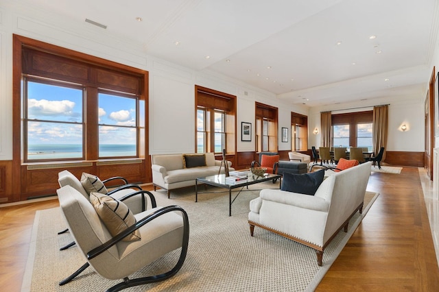 189 E Lake Shore Dr Unit Ph18, Chicago, IL 60611 - living room featuring ornamental molding and a wainscoted wall