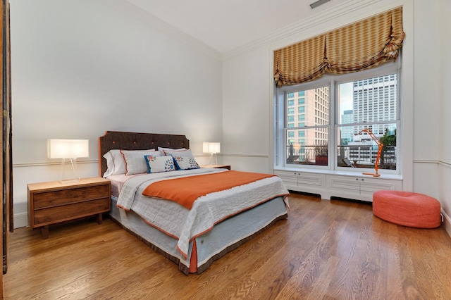 189 E Lake Shore Dr Unit Ph18, Chicago, IL 60611 - bedroom featuring crown molding and wood finished floors