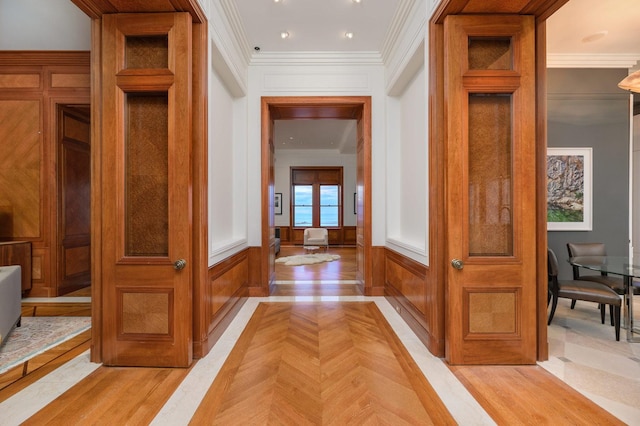 189 E Lake Shore Dr Unit Ph18, Chicago, IL 60611 - hallway featuring ornamental molding, a decorative wall, and parquet floors