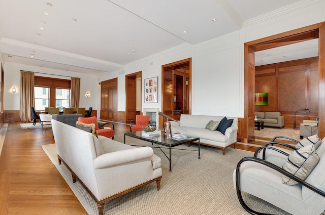 189 E Lake Shore Dr Unit Ph18, Chicago, IL 60611 - living area featuring crown molding, light wood finished floors, and a decorative wall