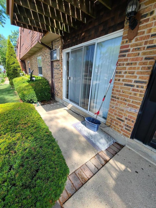 745 Grove Dr Unit 103, Buffalo Grove, IL 60089 - view of exterior entry with brick siding