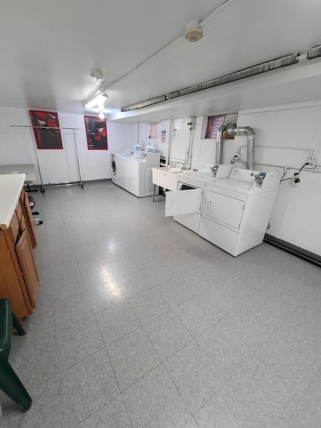 745 Grove Dr Unit 103, Buffalo Grove, IL 60089 - finished below grade area with washer and dryer and a sink