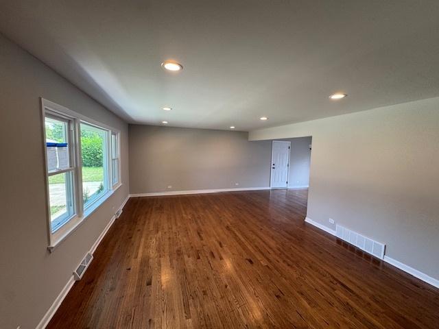 535 Florian Dr, Des Plaines, IL 60016 - unfurnished room with recessed lighting and dark wood-style floors