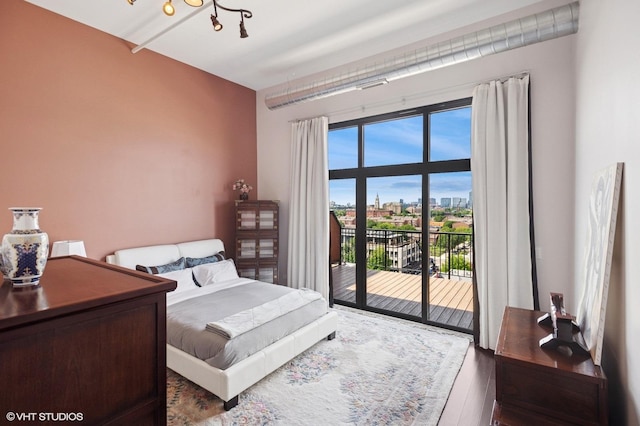 1524 S Sangamon St Unit 802, Chicago, IL 60608 - bedroom with access to exterior and wood finished floors