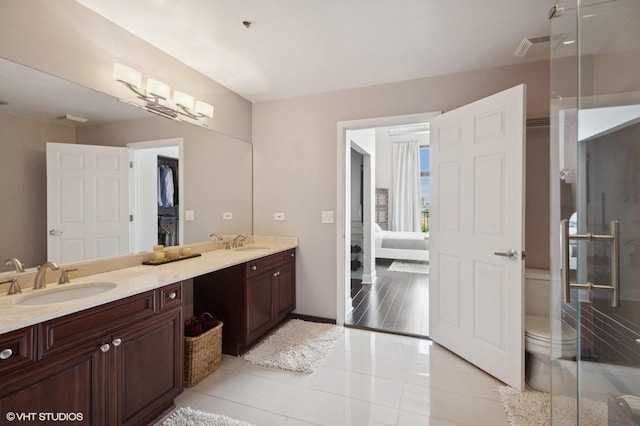 1524 S Sangamon St Unit 802, Chicago, IL 60608 - full bathroom with double vanity, tile patterned flooring, ensuite bathroom, and a stall shower