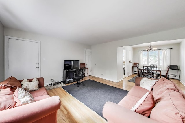 1555 Monroe Ave Unit 2, River Forest, IL 60305 - living area with a chandelier and wood finished floors