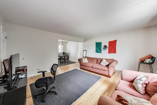 1555 Monroe Ave Unit 2, River Forest, IL 60305 - living area featuring wood finished floors and a chandelier