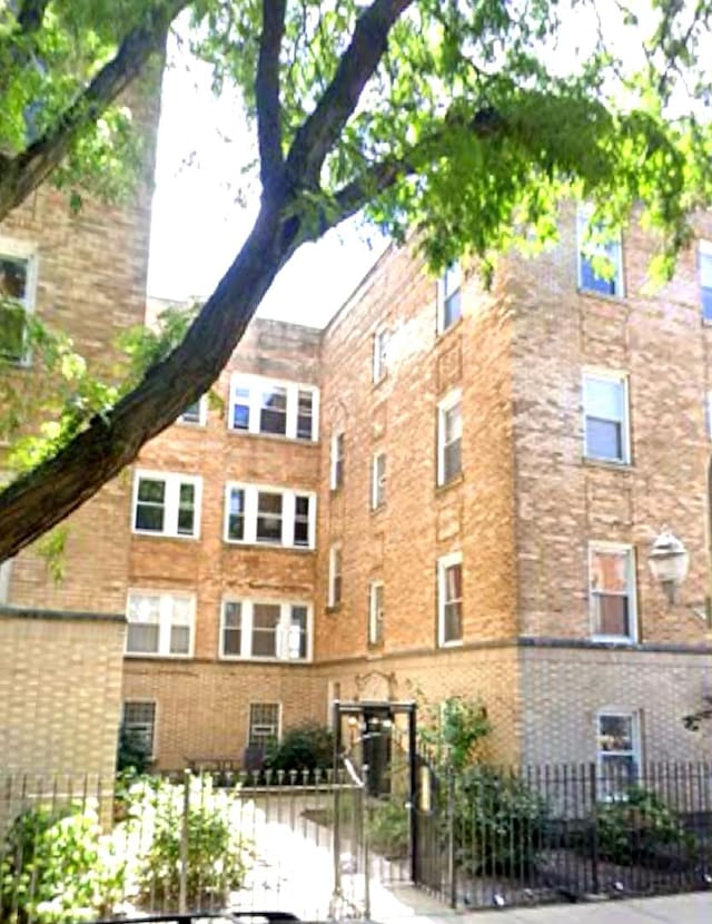 3707 W Altgeld St Unit 1, Chicago, IL 60647 - view of apartment building / complex