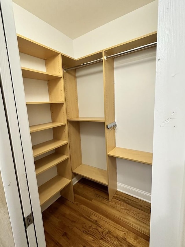 3707 W Altgeld St Unit 1, Chicago, IL 60647 - walk in closet with dark wood-style floors