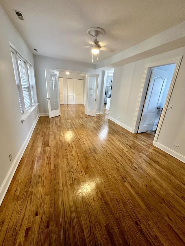 3707 W Altgeld St Unit 1, Chicago, IL 60647 - spare room with wood finished floors and a ceiling fan