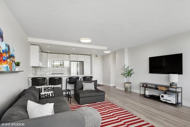 4800 S Chicago Beach Dr Unit 503N, Chicago, IL 60615 - living area with light wood-style floors and recessed lighting