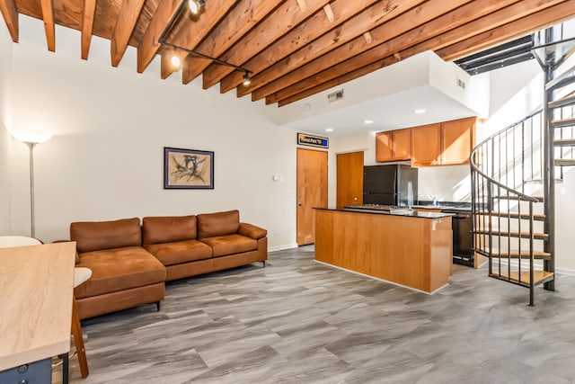 7349 Madison St Unit C, Forest Park, IL 60130 - living room featuring stairs and a wood ceiling with exposed beams
