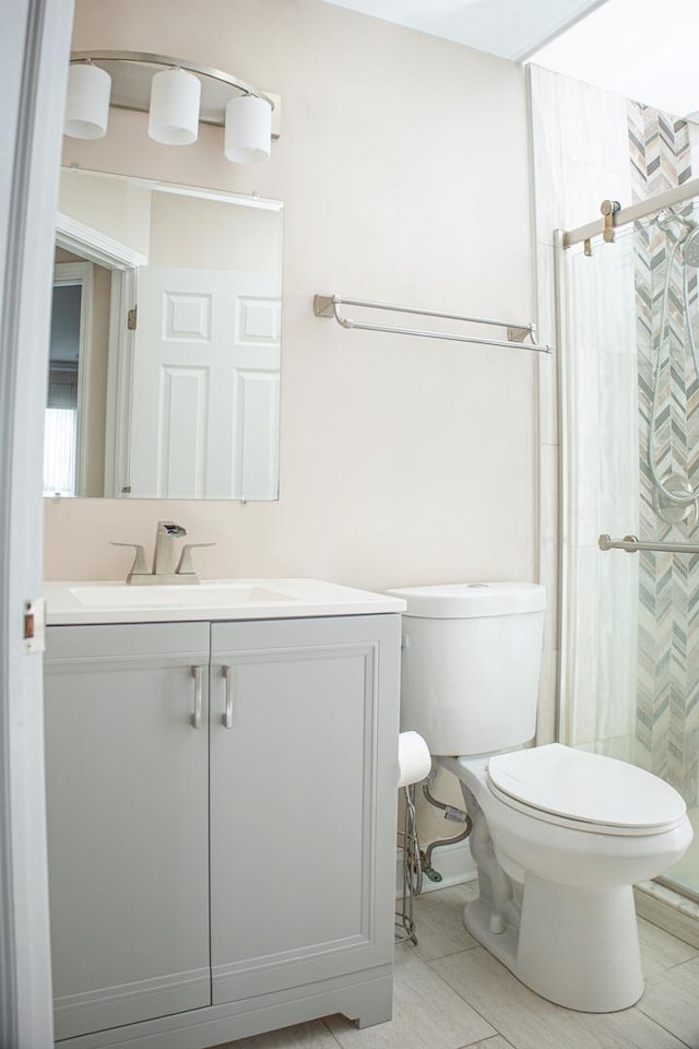 5451 Elizabeth Pl Unit 0, Rolling Meadows, IL 60008 - bathroom featuring vanity, a shower stall, and tile patterned floors