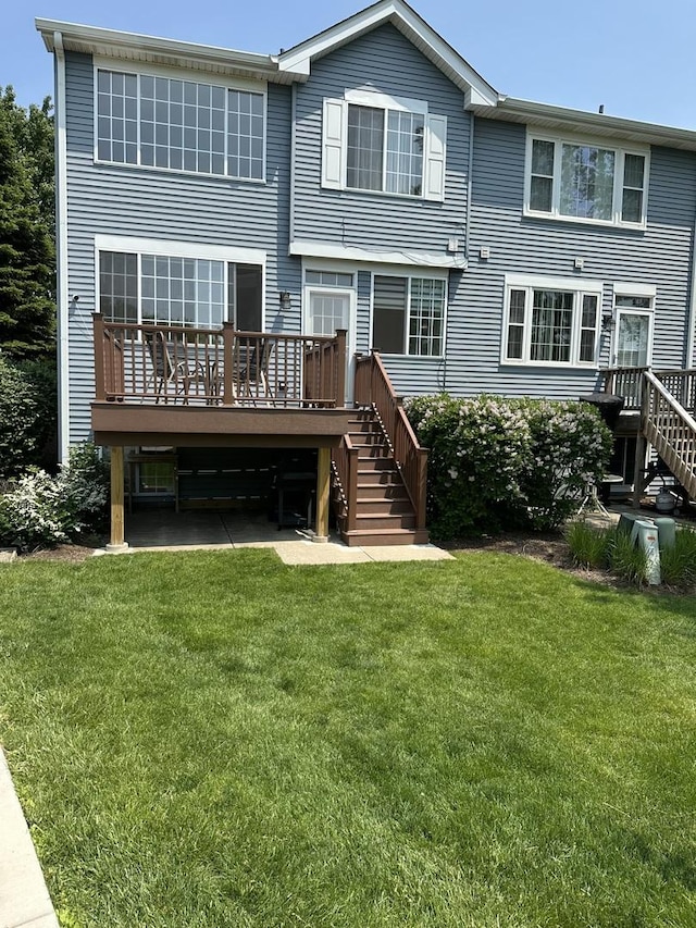 5451 Elizabeth Pl Unit 0, Rolling Meadows, IL 60008 - back of property featuring stairs, a deck, and a yard
