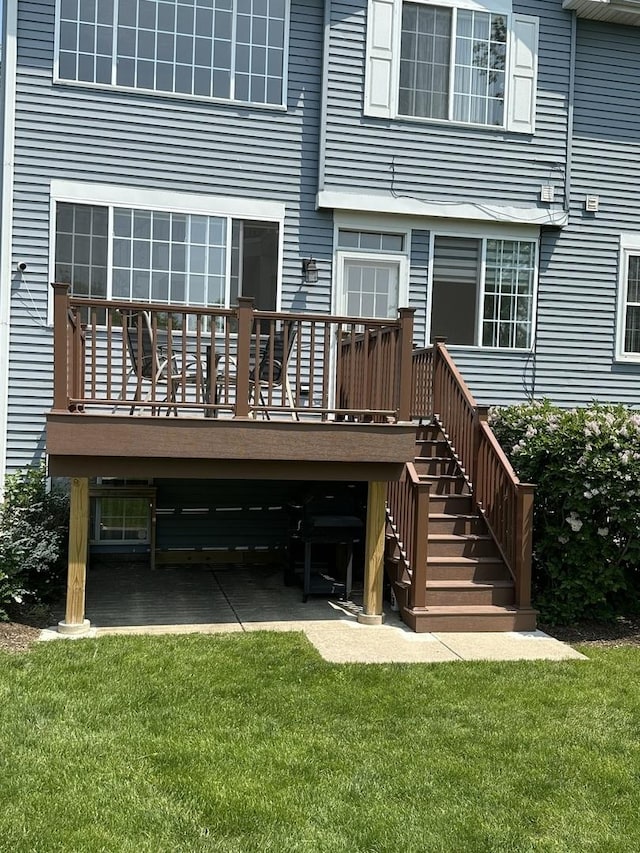 5451 Elizabeth Pl Unit 0, Rolling Meadows, IL 60008 - back of house featuring a lawn, a wooden deck, and stairs
