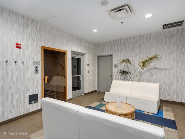225 N Columbus Dr Unit 7207, Chicago, IL 60601 - tiled living area with wallpapered walls, attic access, and recessed lighting