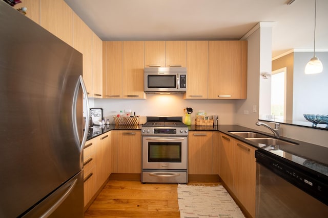 225 N Columbus Dr Unit 7207, Chicago, IL 60601 - kitchen with appliances with stainless steel finishes, light wood-style flooring, light brown cabinetry, and pendant lighting