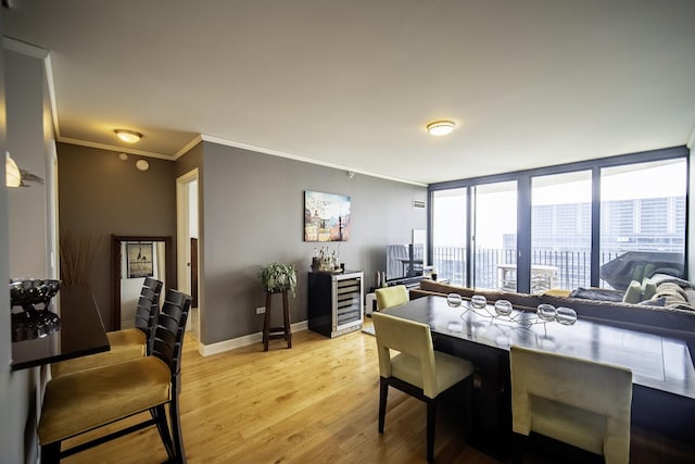 225 N Columbus Dr Unit 7207, Chicago, IL 60601 - dining area with ornamental molding, light wood finished floors, and wine cooler