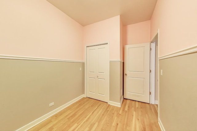1949 N Whipple St Unit 1, Chicago, IL 60647 - unfurnished bedroom with light wood finished floors and a closet